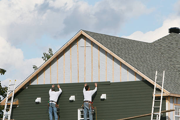 Professional Vinyl Siding technician working in Glenville, PA
